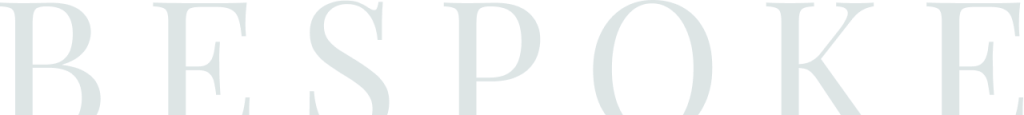 Large, light gray capital letters spell out the word "BESPOKE" across a white background.